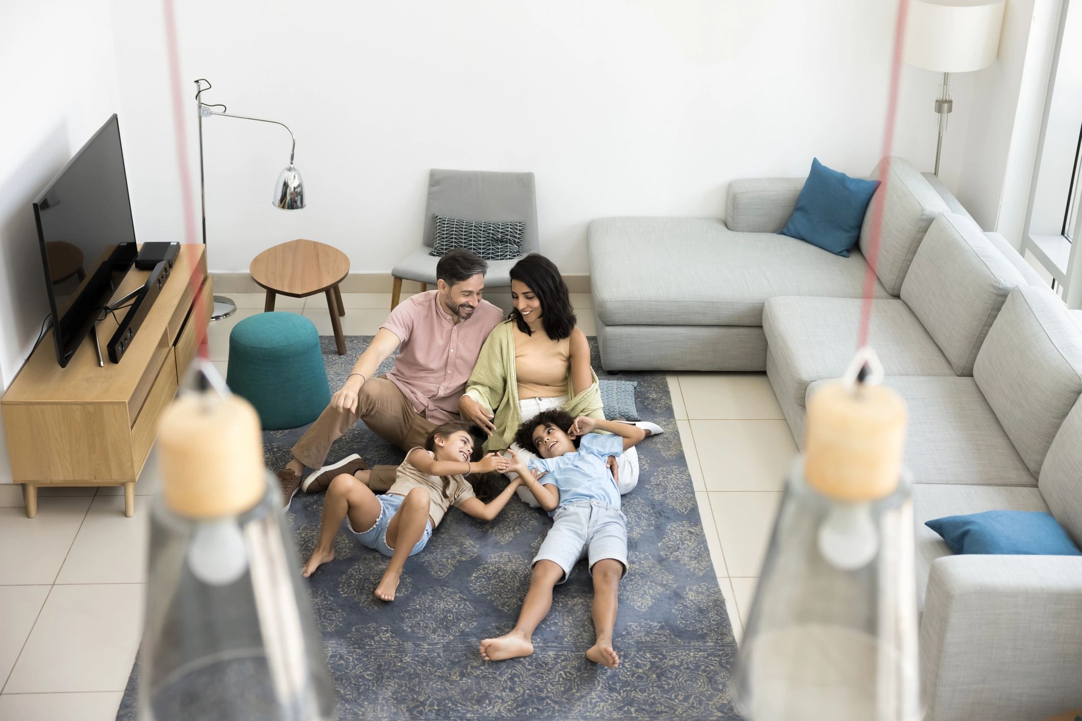 Family spending relaxed time together, representing family game night