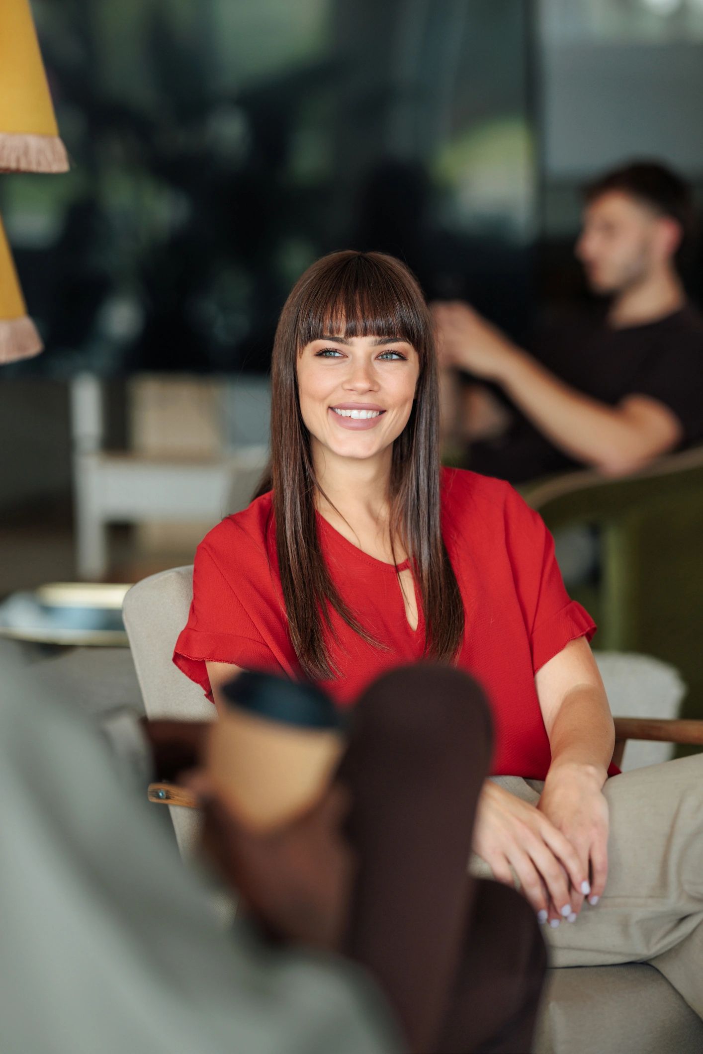 Smiling team member in a café setting