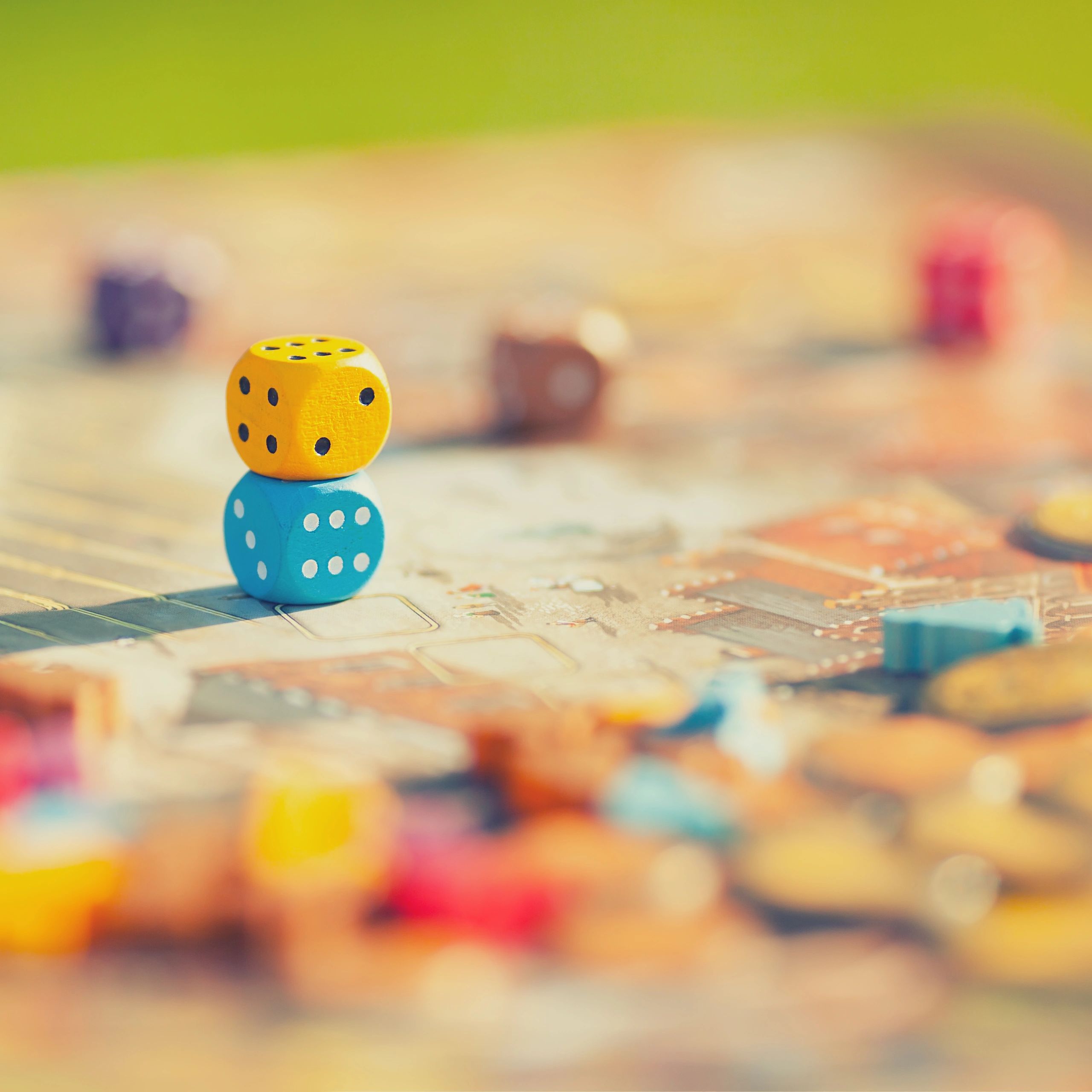 Board game pieces and snacks on a table
